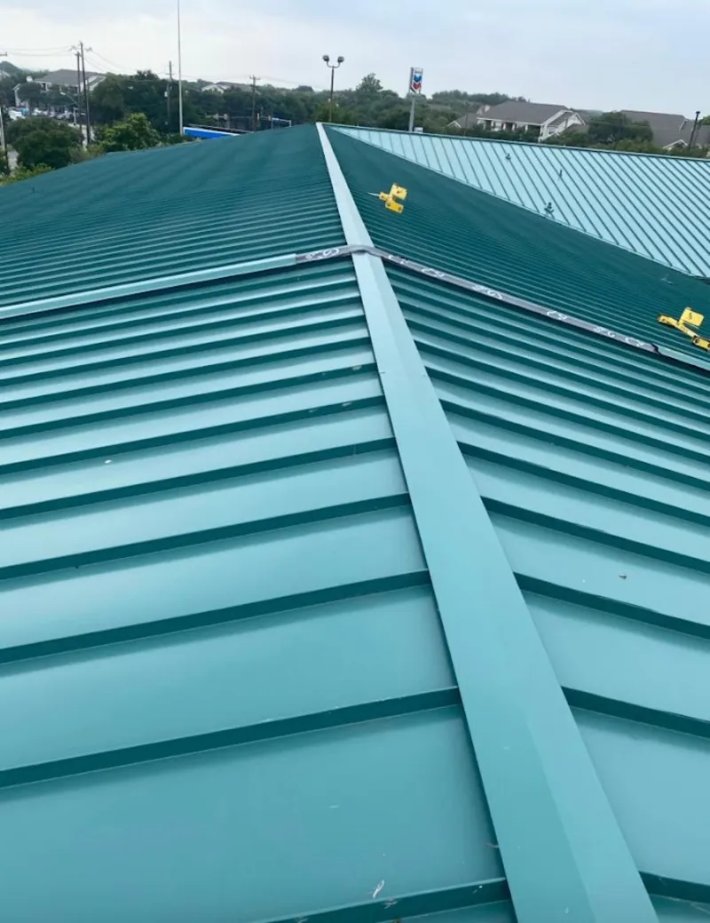 Green commercial metal roof ridge and valley for Metal Roof Repair in Asbury Lake