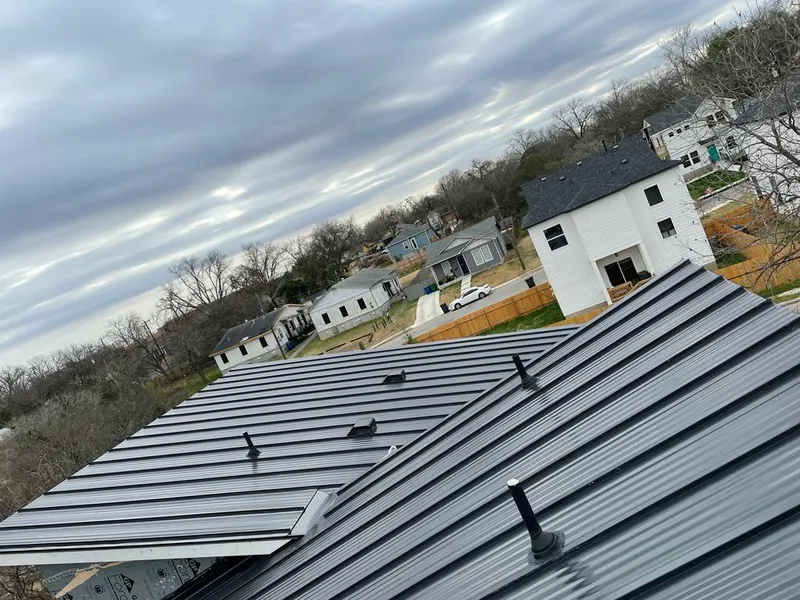 Standing seam metal roof panels with vents for Skylight Repair in Asbury Lake